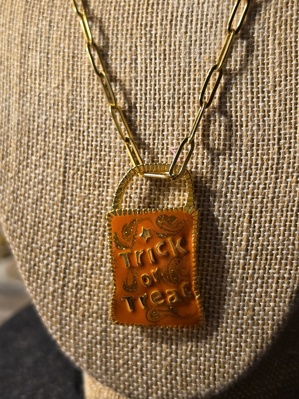 Gold-Tone Necklace with Orange 'Trick or Treat' Pendant